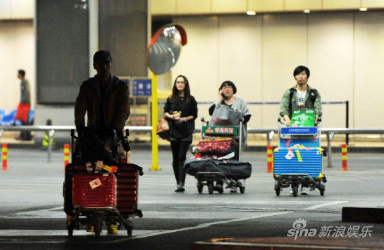 任重姚笛避緋聞 機場分分合合難默契